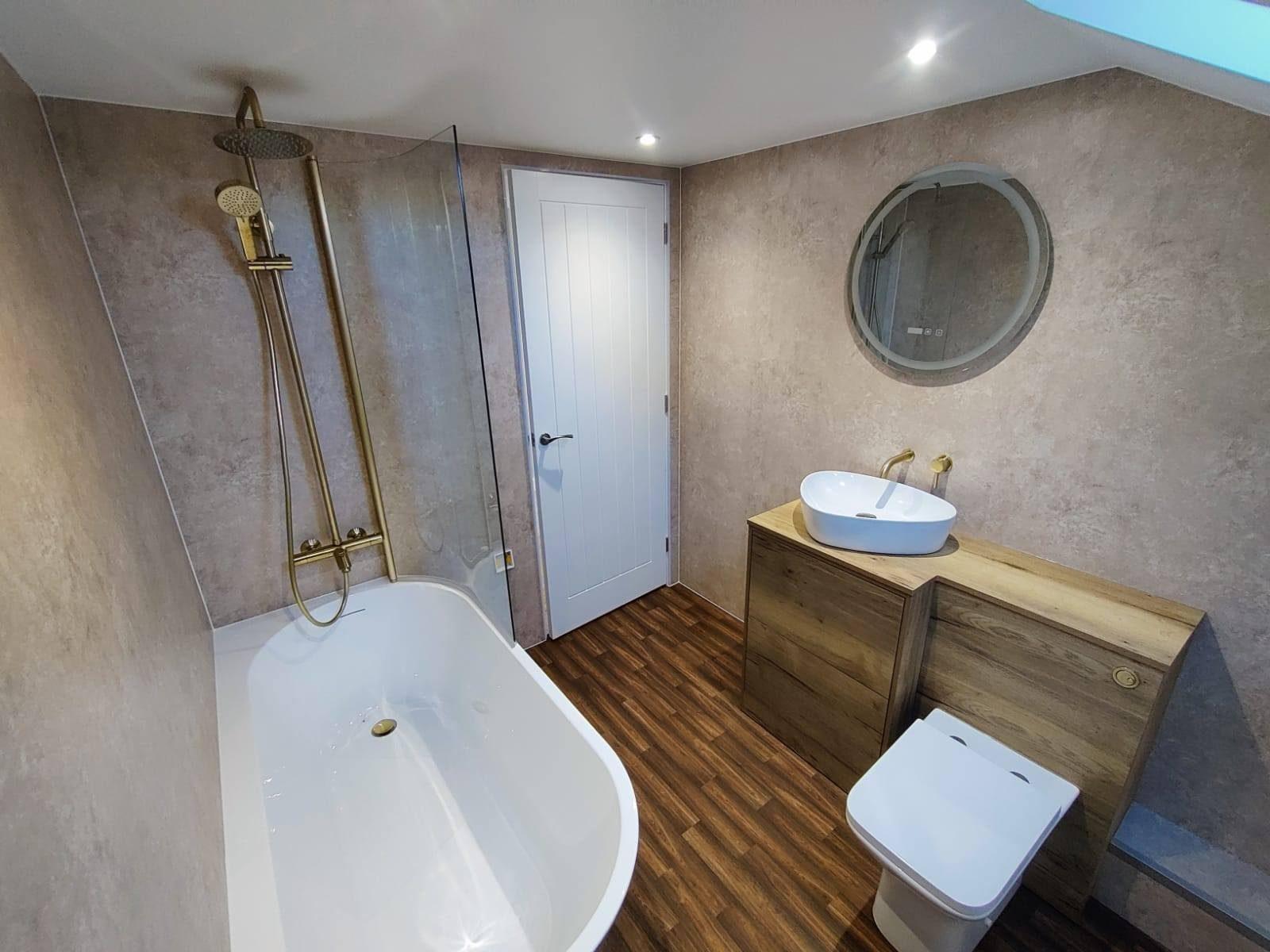 Premium bathroom renovation with freestanding bath by Clifford Building Contractors